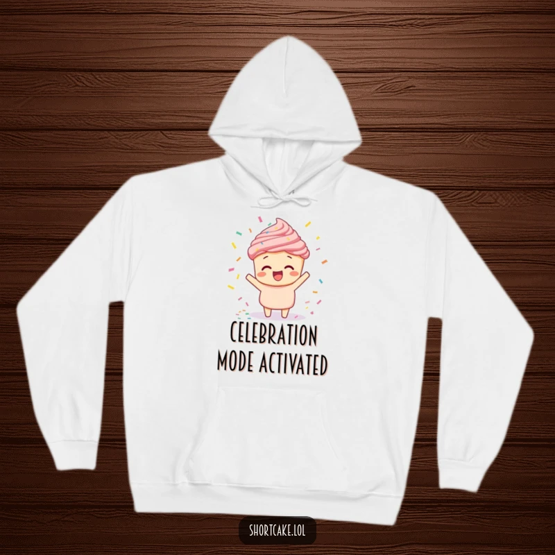 Funny shortcake doing a confetti toss hoodie, a dessert character celebrating with enthusiasm, offering warmth and festive cheer.