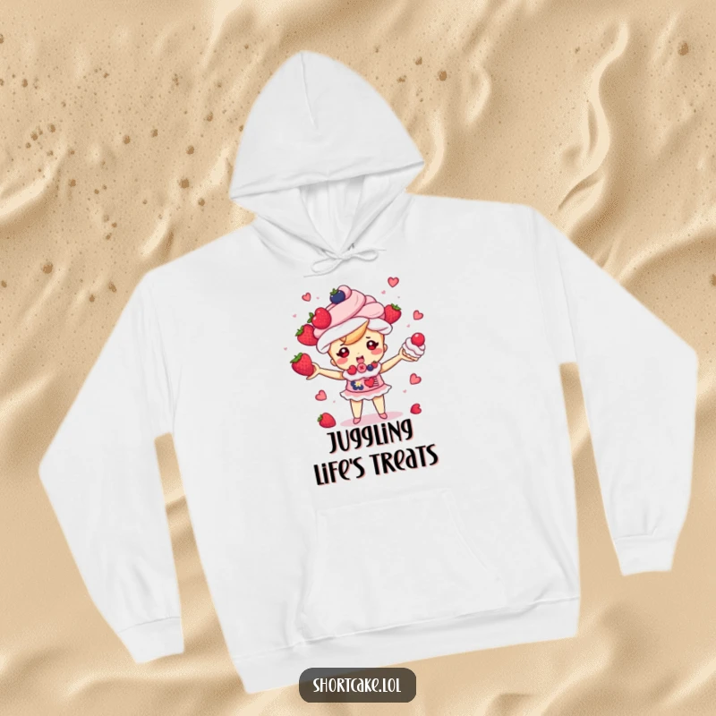 Funny shortcake character juggling small berries and cream puffs, soft and warm hoodie, cute dessert illustration, a funny gift.
