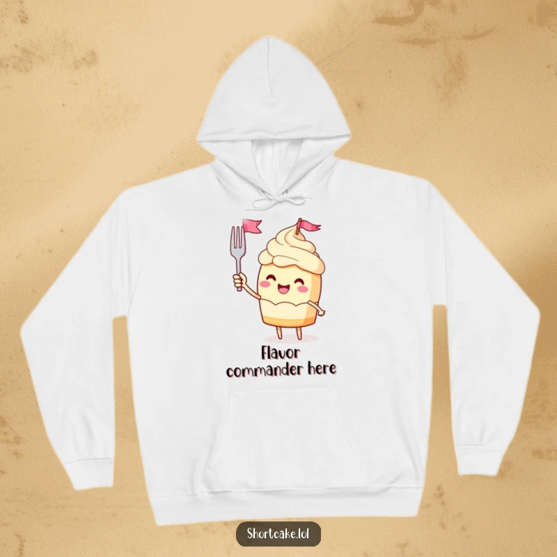 Funny hoodie featuring a jubilant shortcake character waving a miniature fork flag, offering warmth and celebratory vibes.