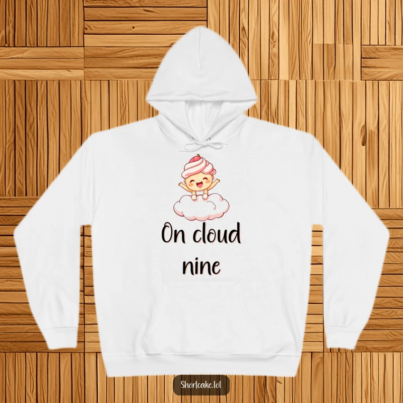 Funny shortcake hoodie with a giggling shortcake bouncing on a fluffy cloud, ideal for cozy and joyful moments.