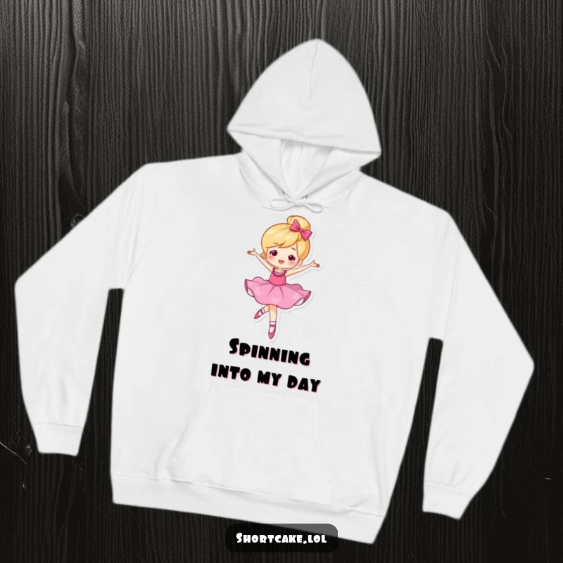Funny hoodie featuring a shortcake character mid-pirouette, capturing the joy and humor of ballet.