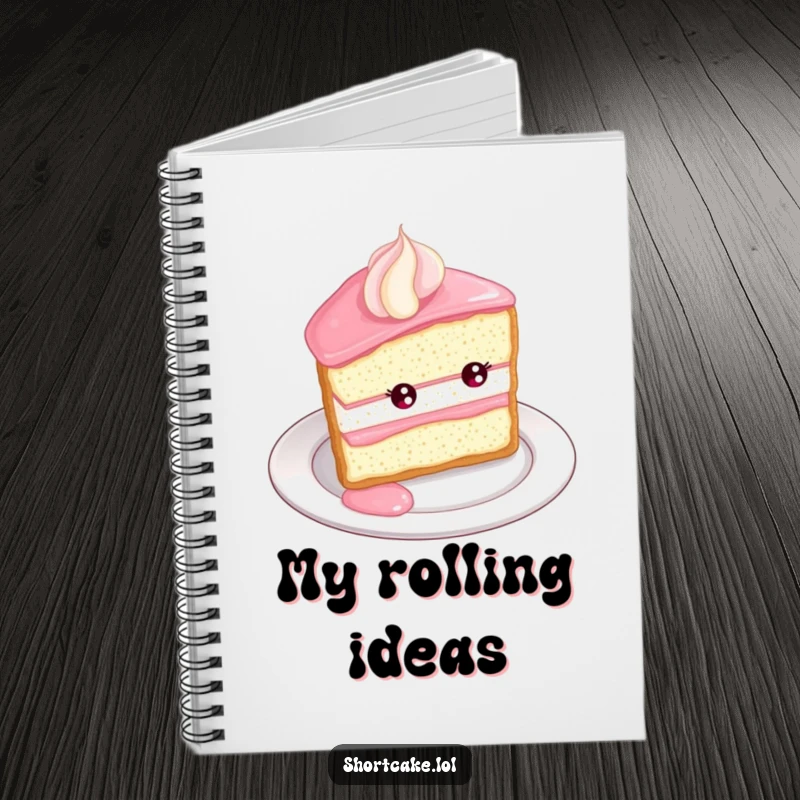Funny Shortcake Roll Notebook. A shortcake slice rolls with delight down a plate edge on the cover of a notebook, perfect for notes.