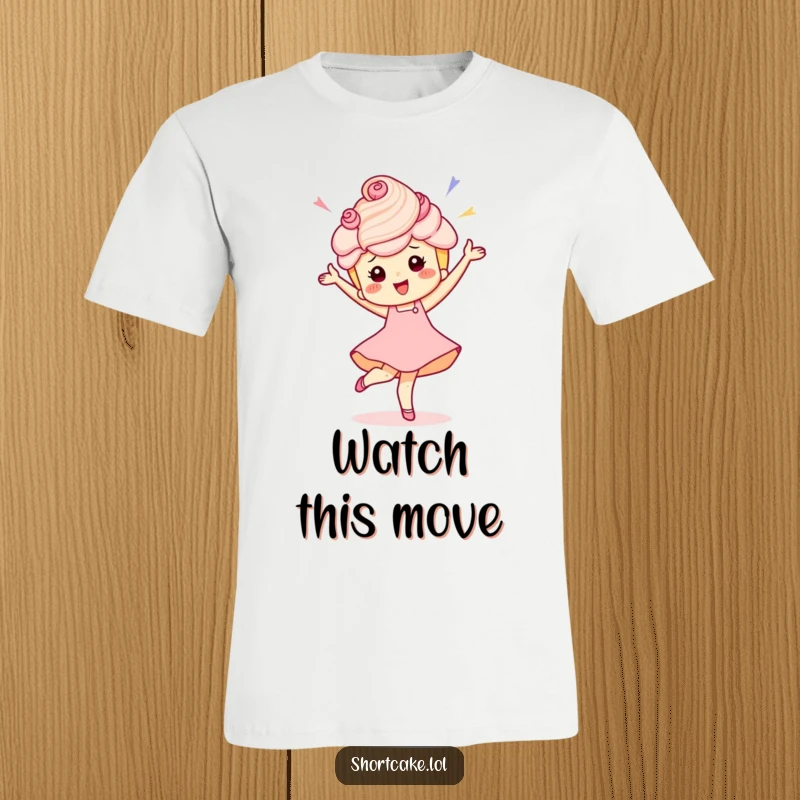 Funny T-shirt with a smiling shortcake character doing a lively, celebratory pirouette with whipped cream accents.