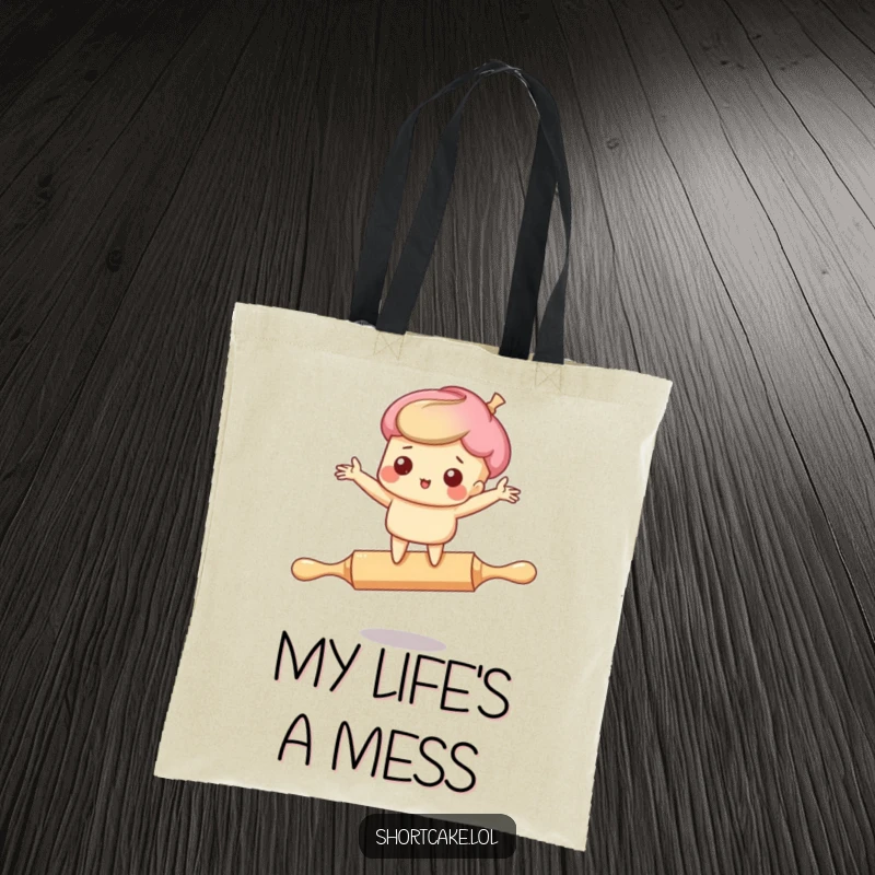 Funny tote bag design: A cute shortcake character comically struggling for balance on a rolling pin, creating a hilarious scene.