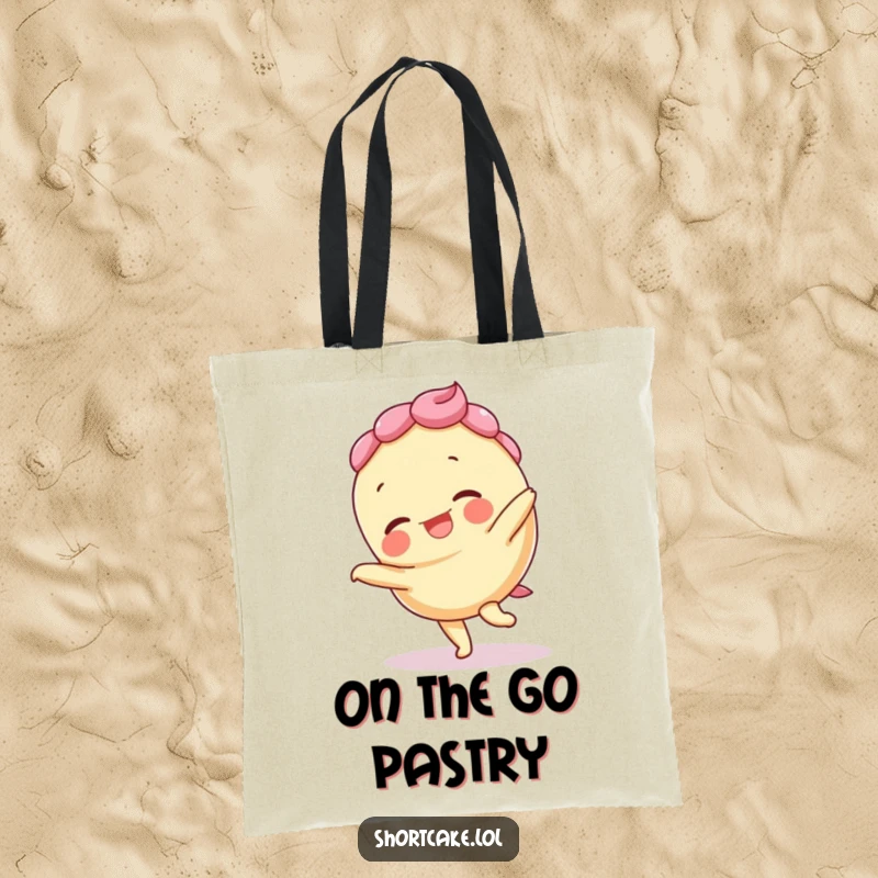 Funny tote bag with a giggling shortcake doing a cartwheel, layers askew, perfect for carrying fun and essentials.